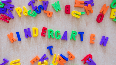  colorful magnet letter spelling the word kindergarten